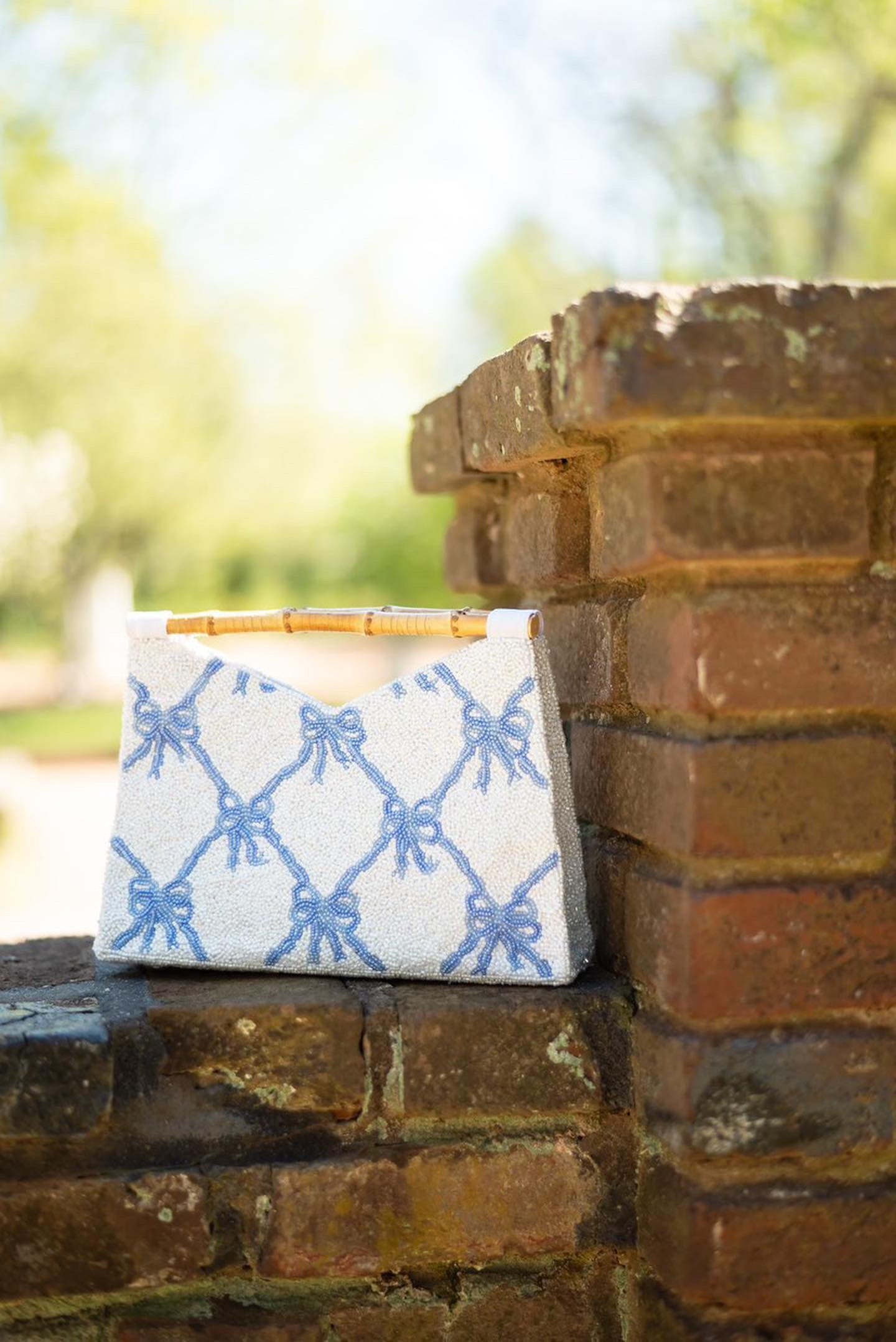 Bamboo Handle Clutch in Blue Bows