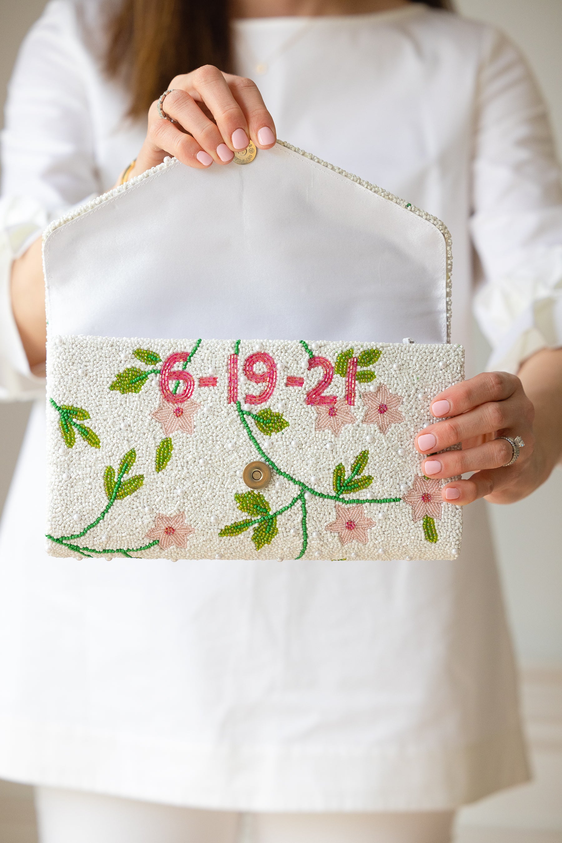 custom beaded bridal clutch with date